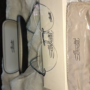 SILHOUETTE FRAMES. BRAND NEW.  52/17.  Original box, case etc.  Blue/turquoise
